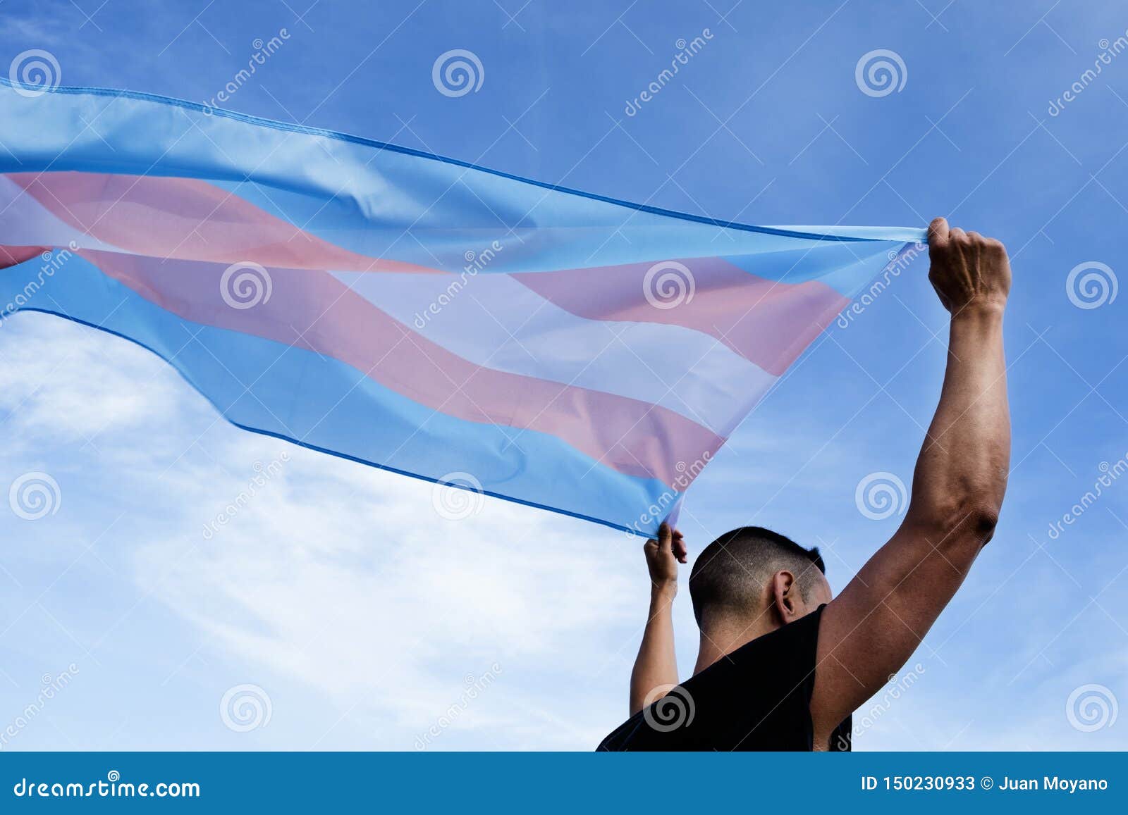 young person with a transgender pride flag