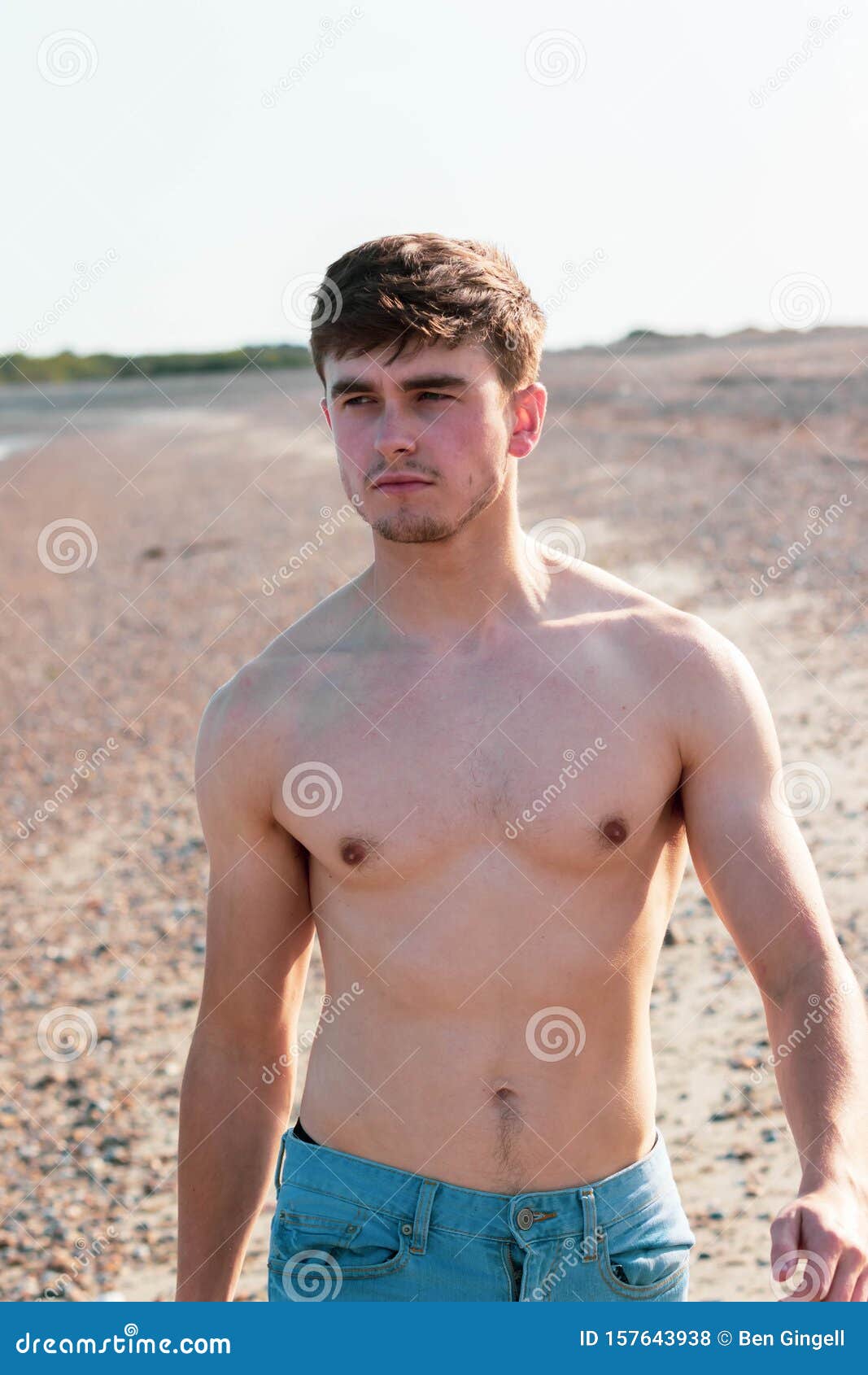 Shirtless on a beach stock photo. Image of male, bare - 157643938