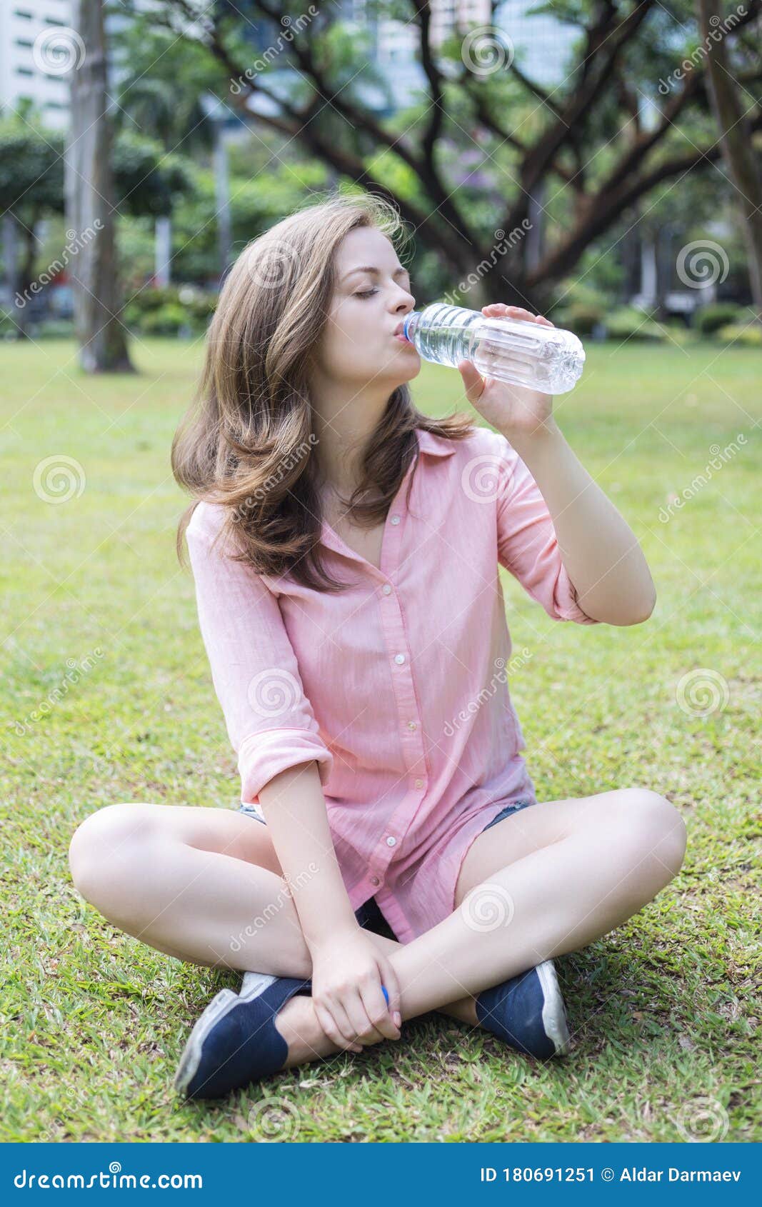 Young Girl Drinking From Water Bottle Stock Photo 