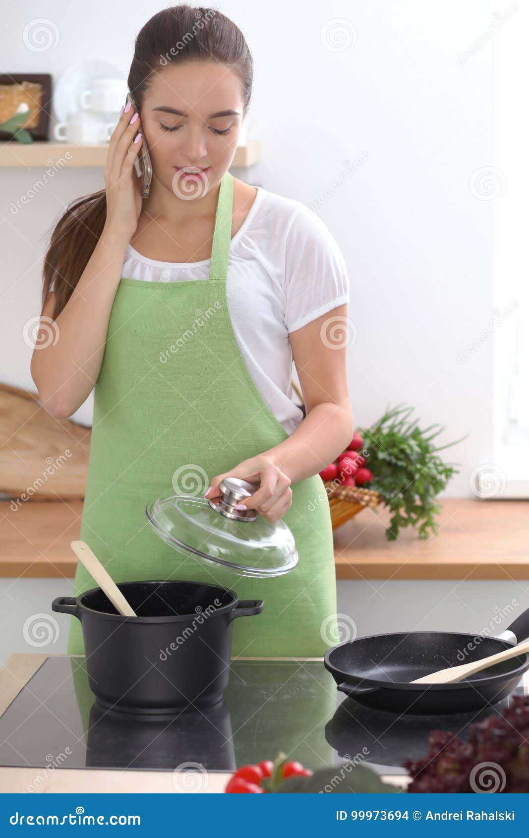 Woman In Apron On A Modern Kitchen Stock Photo - Image of 