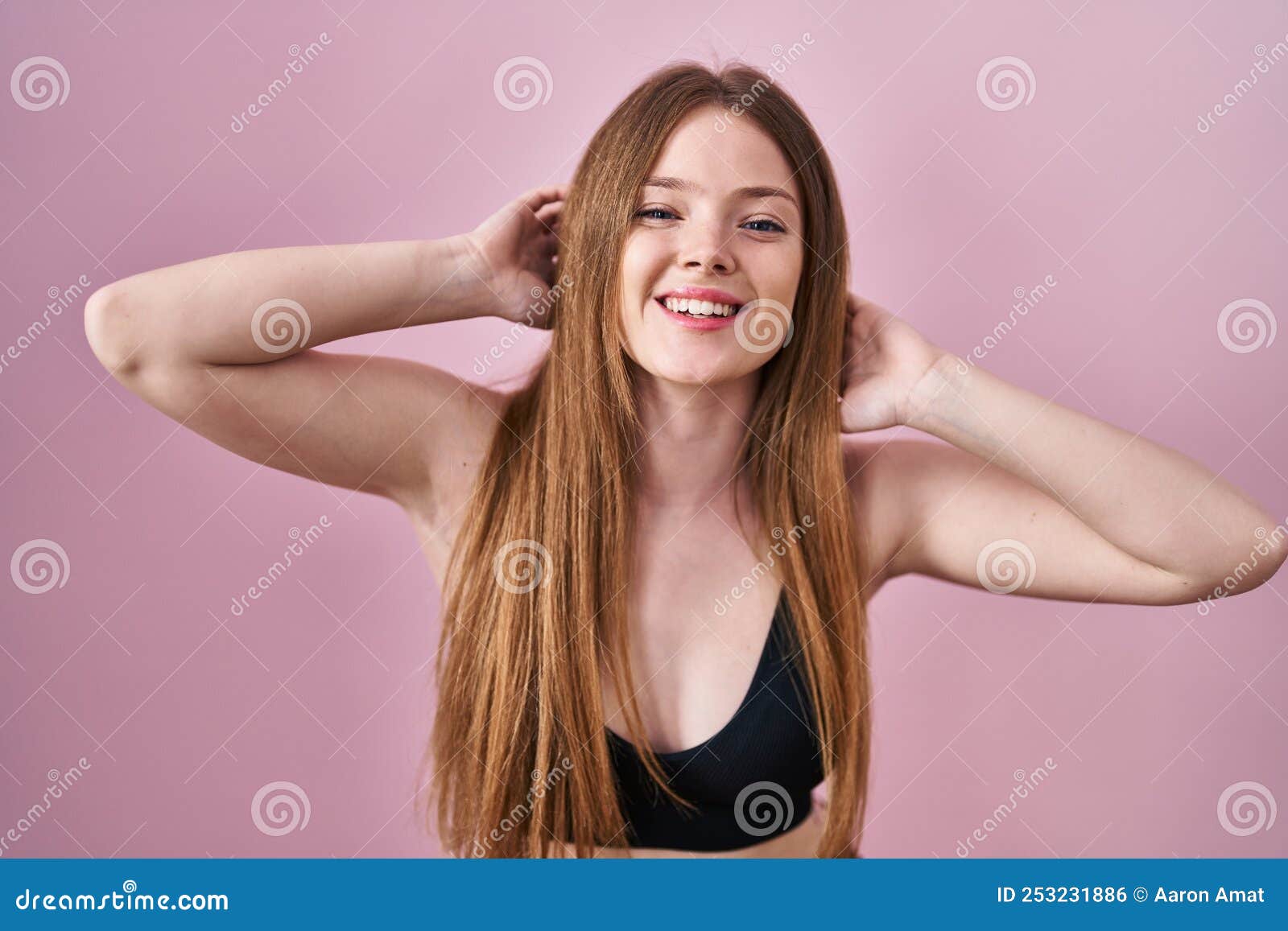 thick woman in lingerie lying at sunlight on fur laughing Stock Photo