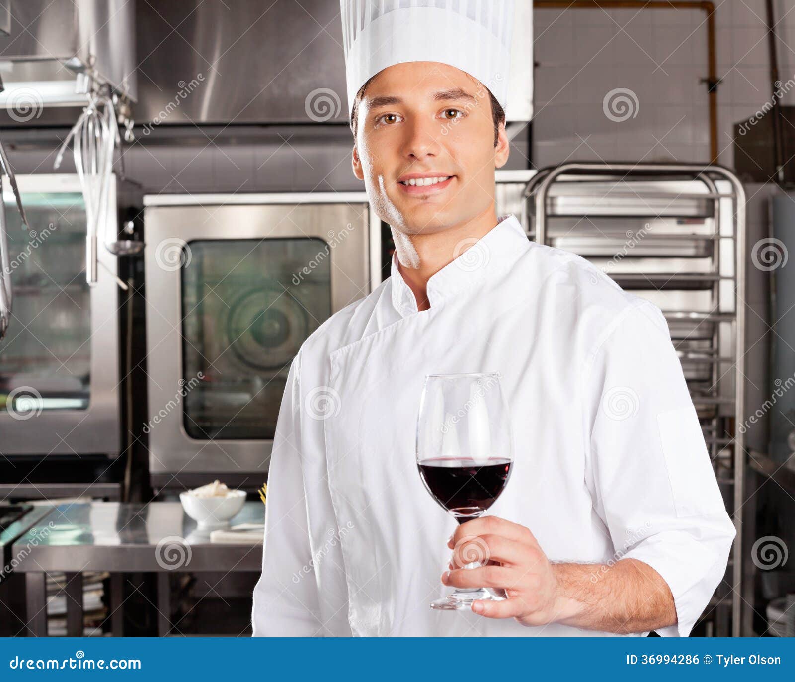 Young Chef Holding Wine Glass Stock Photo Image of restaurant, glass