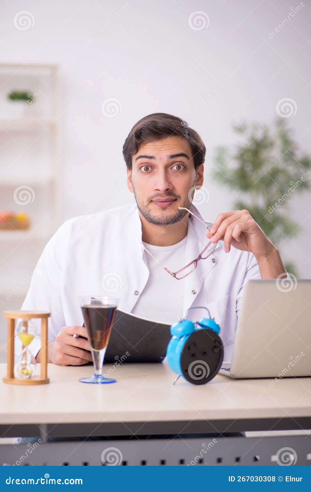 Young Male Chemist Examining Soft Drink Stock Photo Image of nail