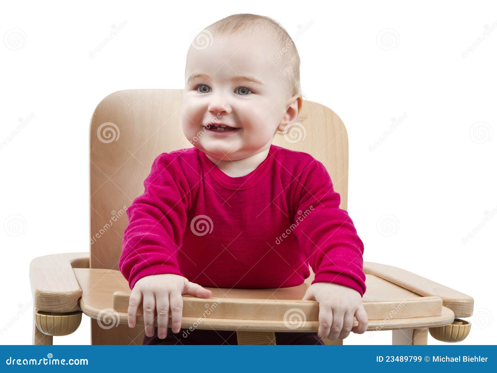 young child sitting in high chair stock image - image of