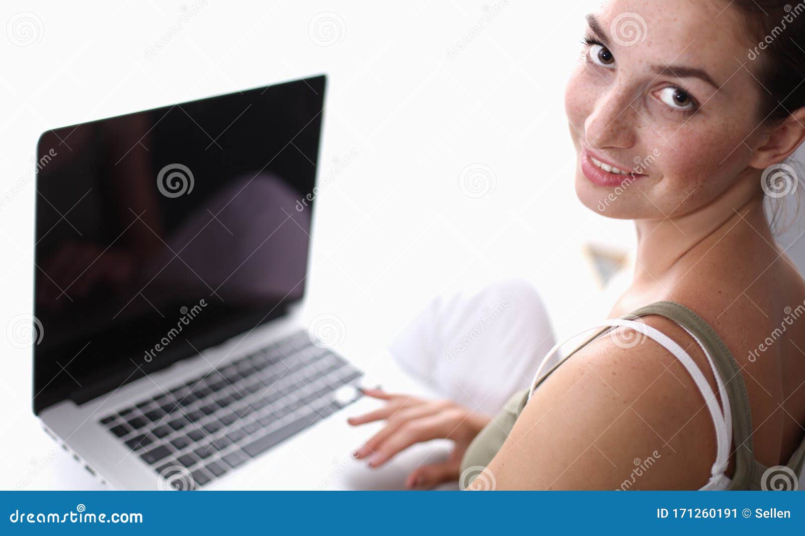 A Young Colledge Girl Sitting on the Floor with a Laptop Stock Image ...