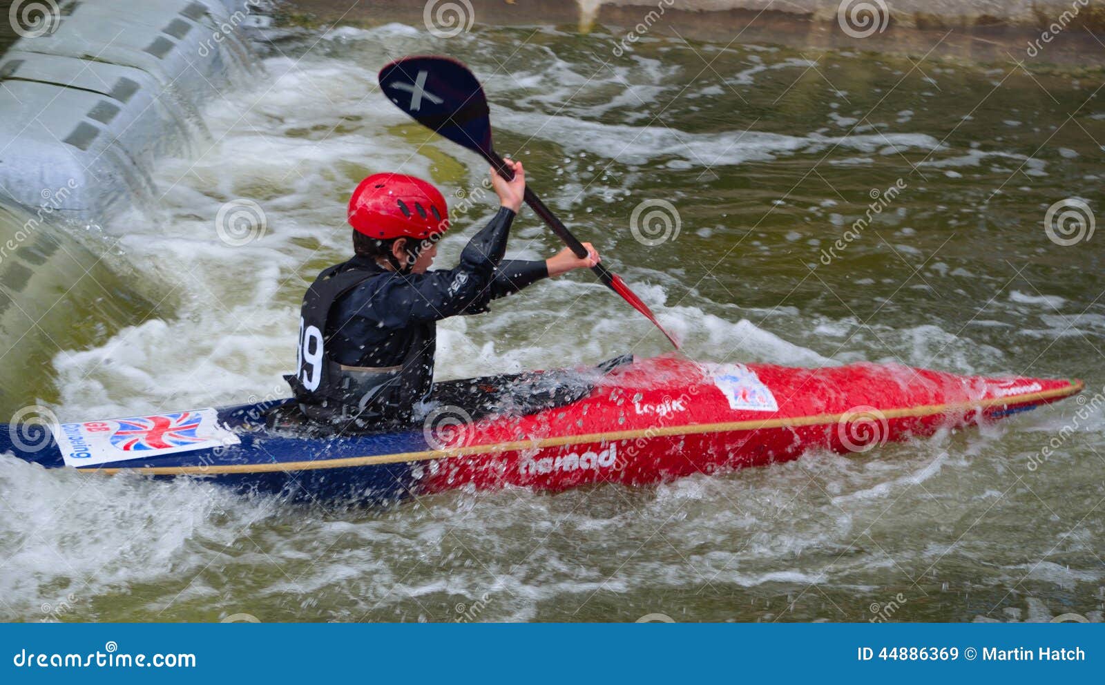 Bedford, Bedfordshire, England - August 31, 2014:Young Competitor in competition at Bedford Viking Kayak Club Cardington Slalom Course.