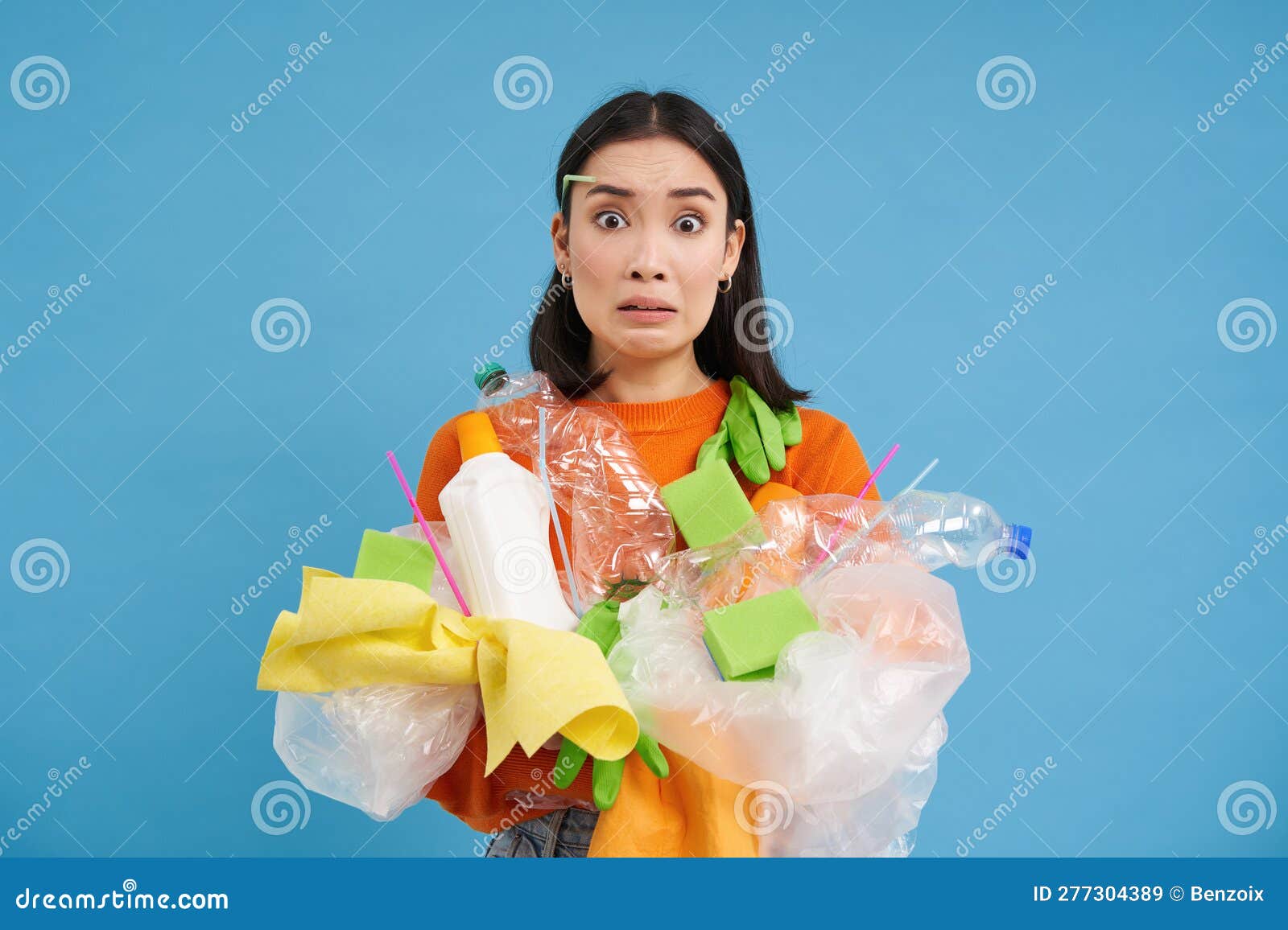 Young Confused Asian Girl with Different Types of Plastic, Learns How ...