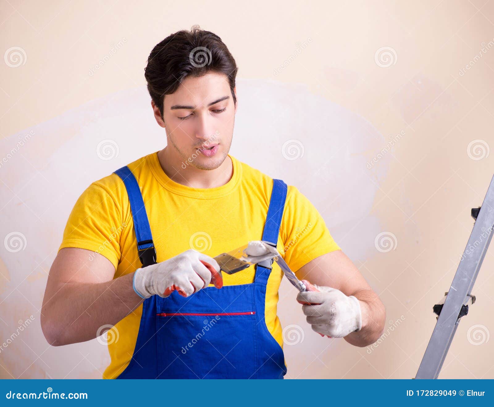 Young Contractor Employee Applying Plaster on Wall Stock Image Image of construction, building