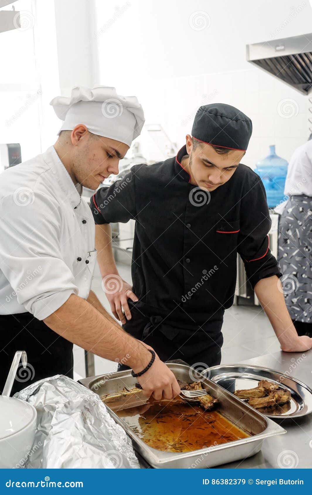 Young Cook Prepares Food in Competition Editorial Stock Image - Image