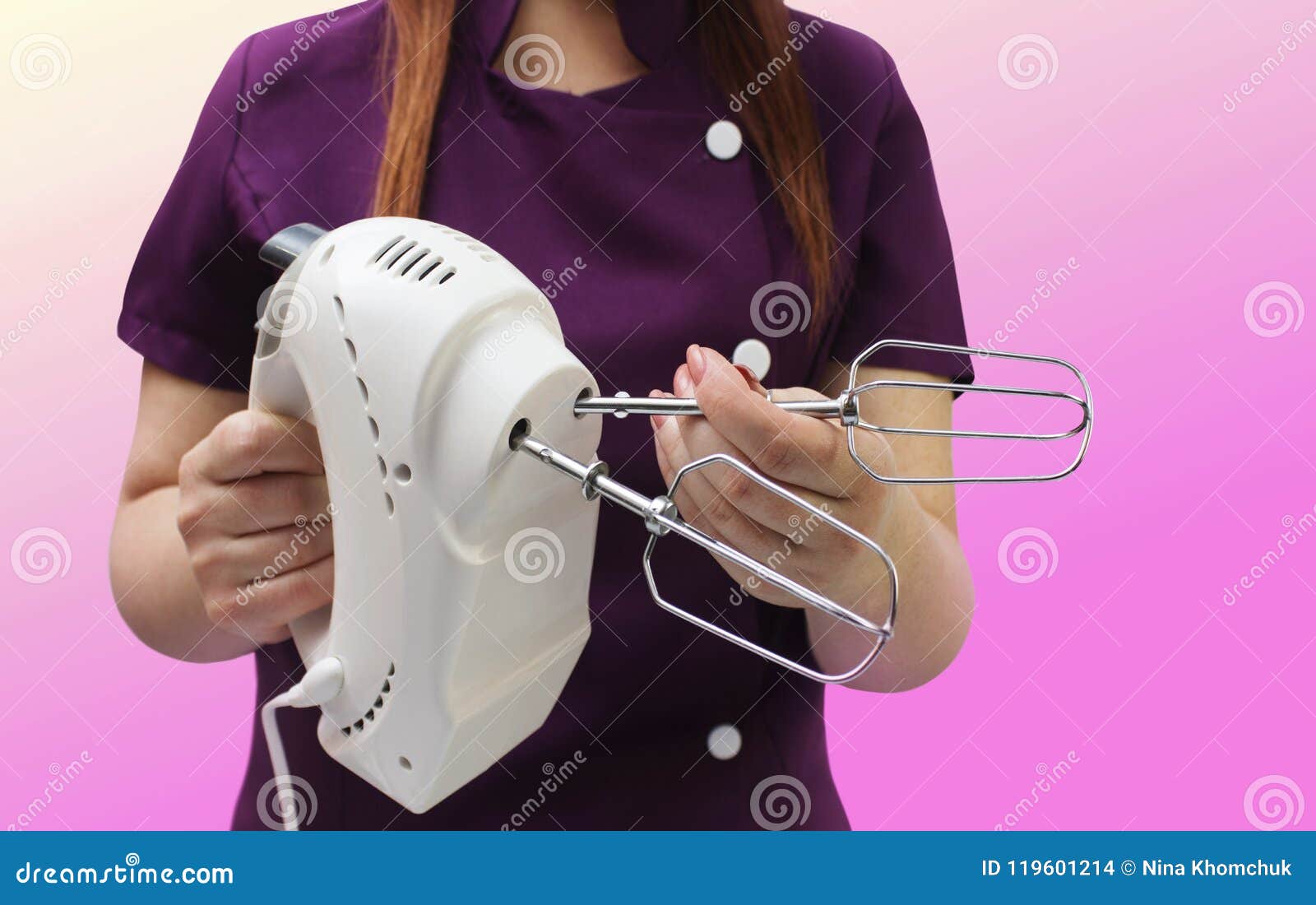 A Cook Holding a Hand Mixer Stock Photo Image of cooking, electronic