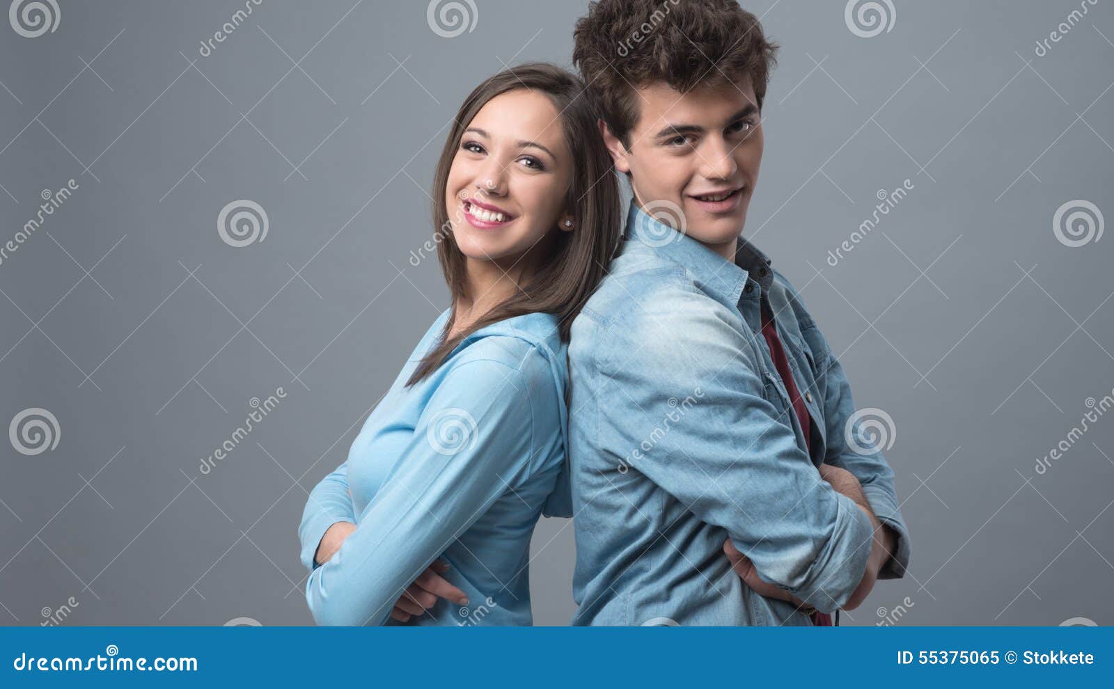 Young couple back to back stock image. Image of compatibility - 55375065
