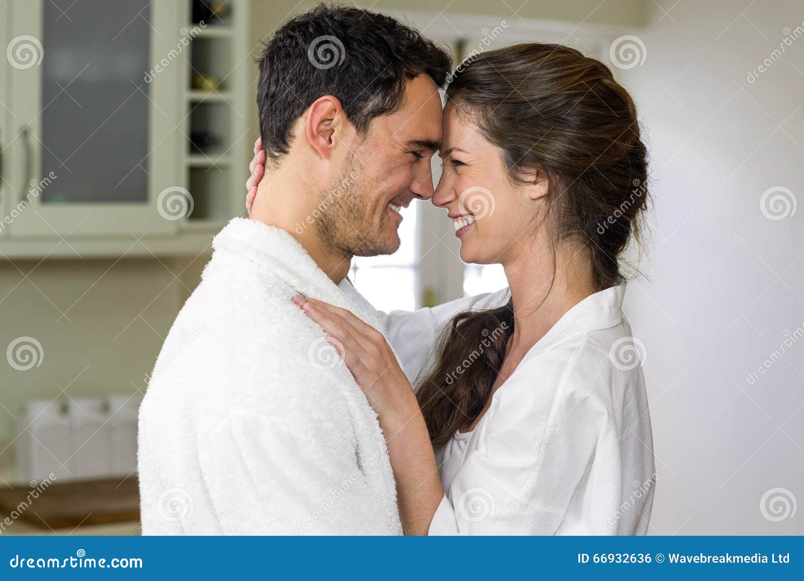 Young Couple Bathrobe Cuddling Each Other Stock Photos Free & Royalty