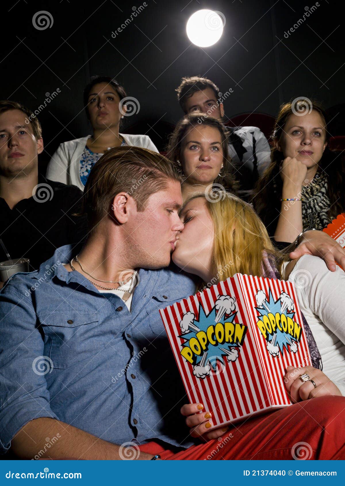 Young couple at the cinema stock photo. Image of audience 21374040