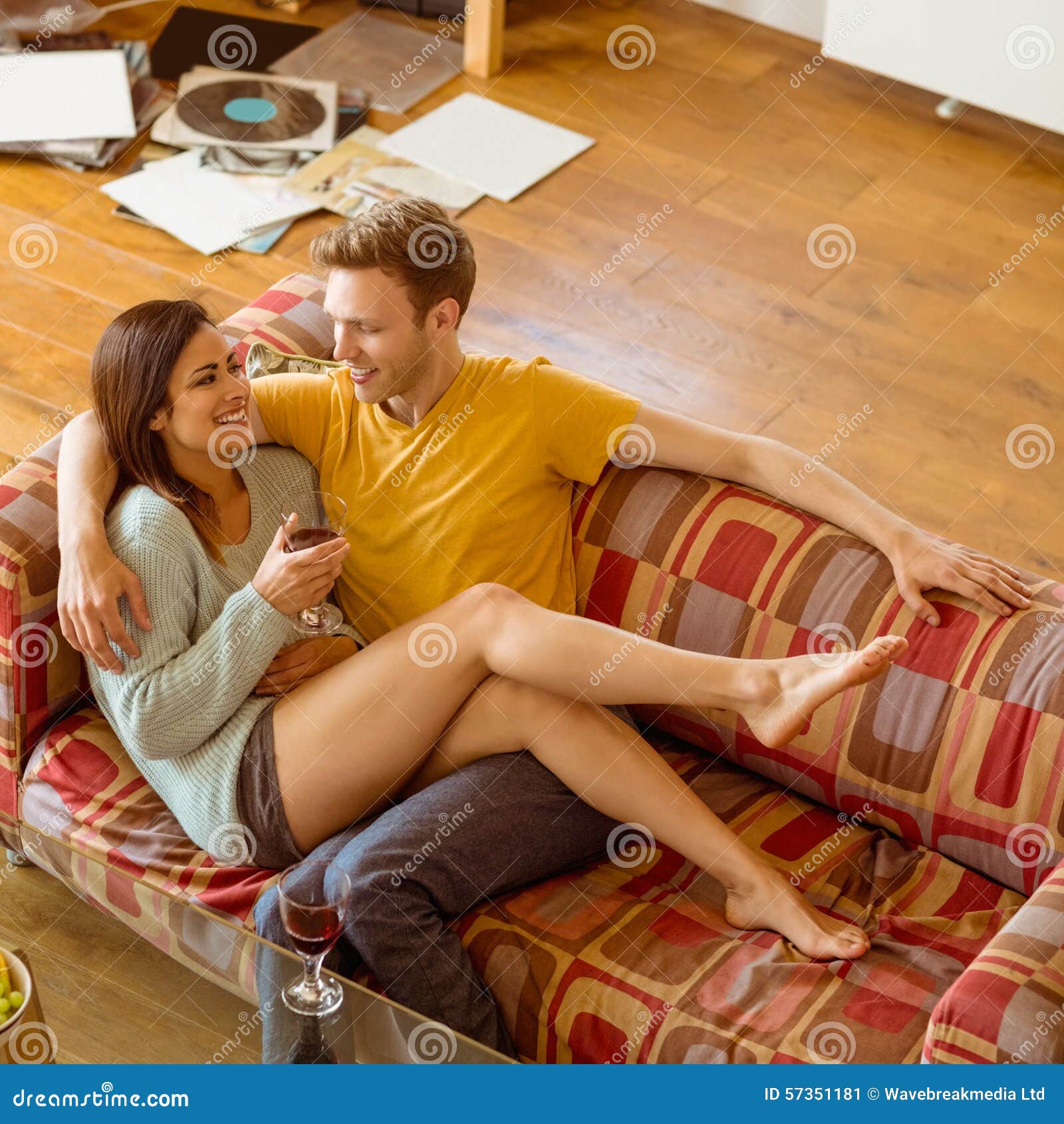 couple cuddling on couch