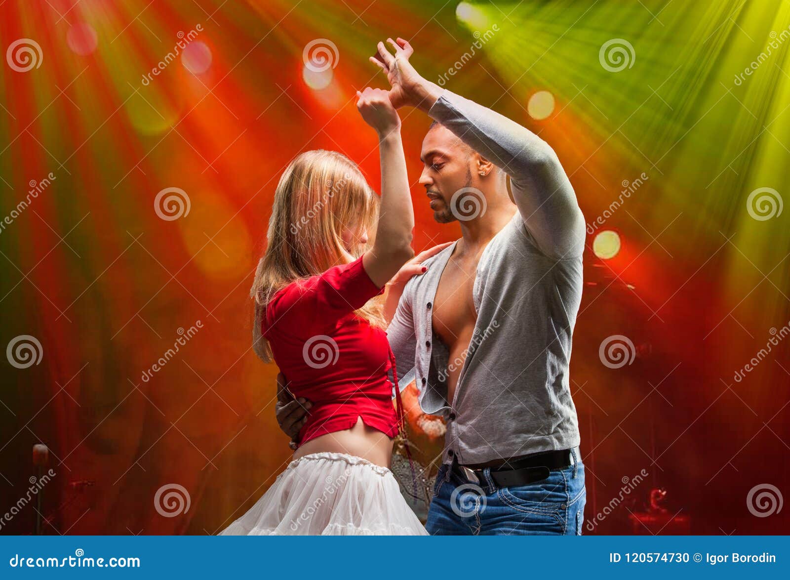 young couple dances caribbean salsa