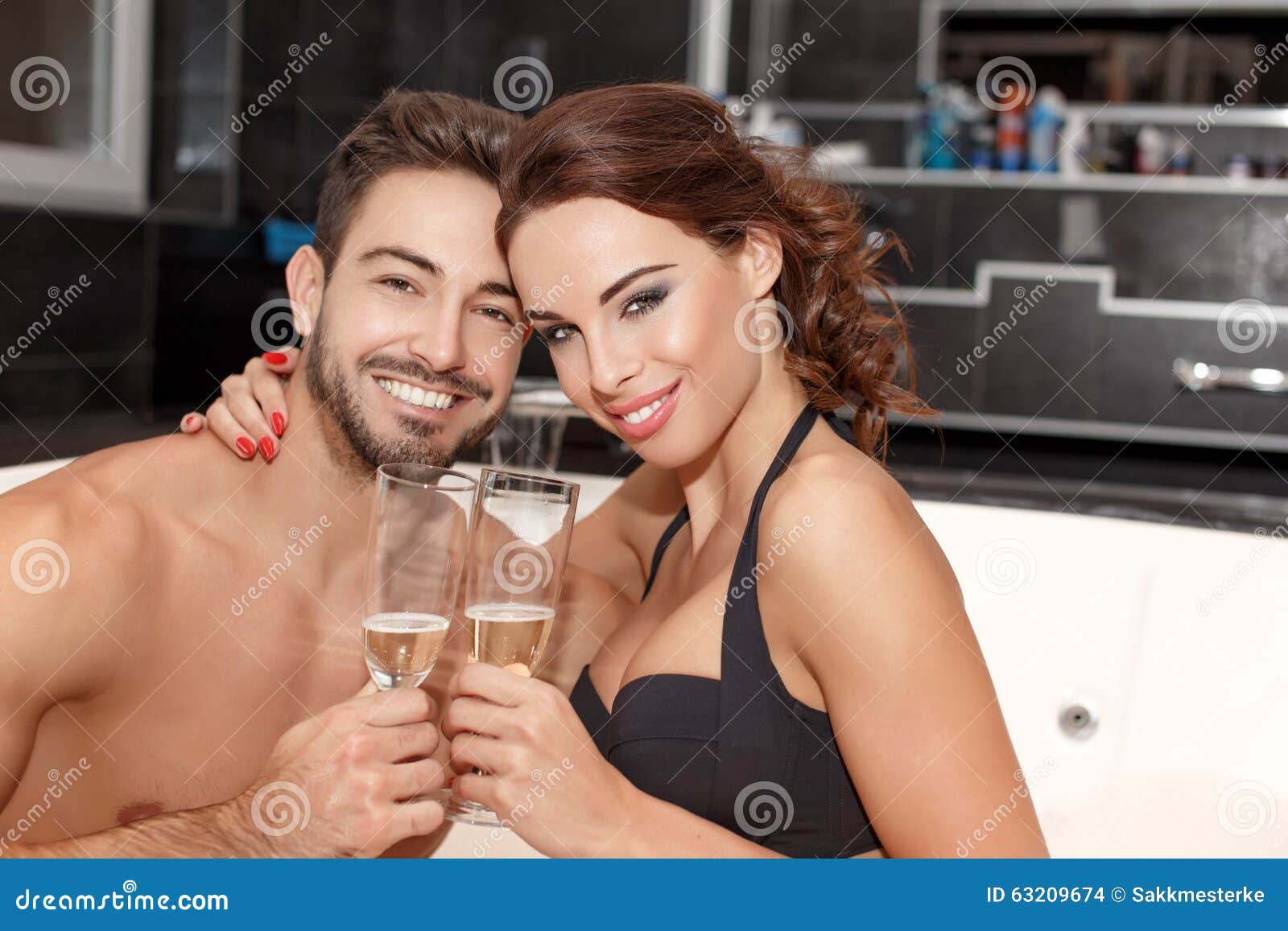 Young Couple Drinking Champagne in Jacuzzi Stock Photo Image of bath, couple 63209674