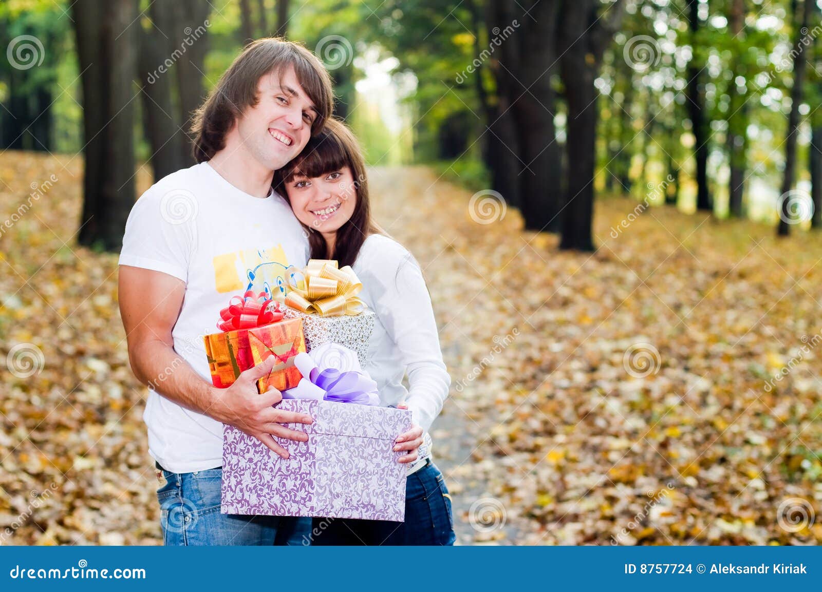 Young Couple with Gift Boxes Stock Photo Image of adult, 8757724