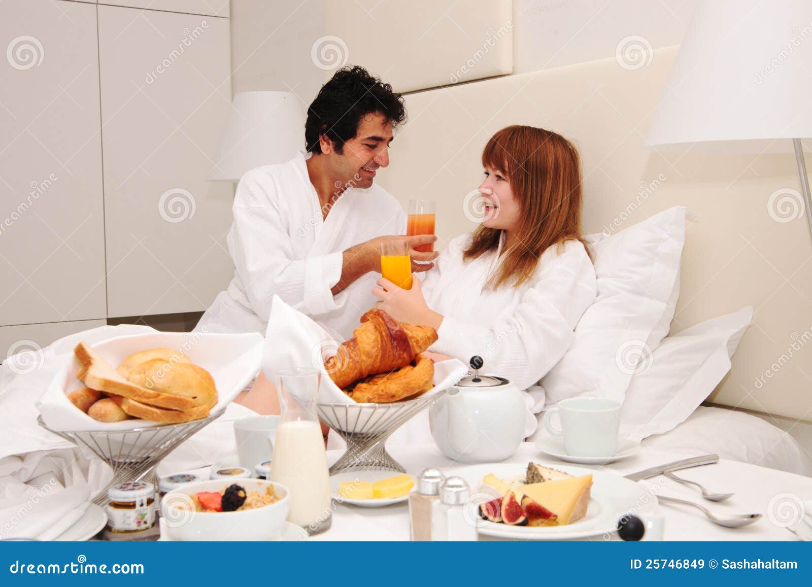 Young Couple Having Breakfast In Bed Royalty Free Stock 