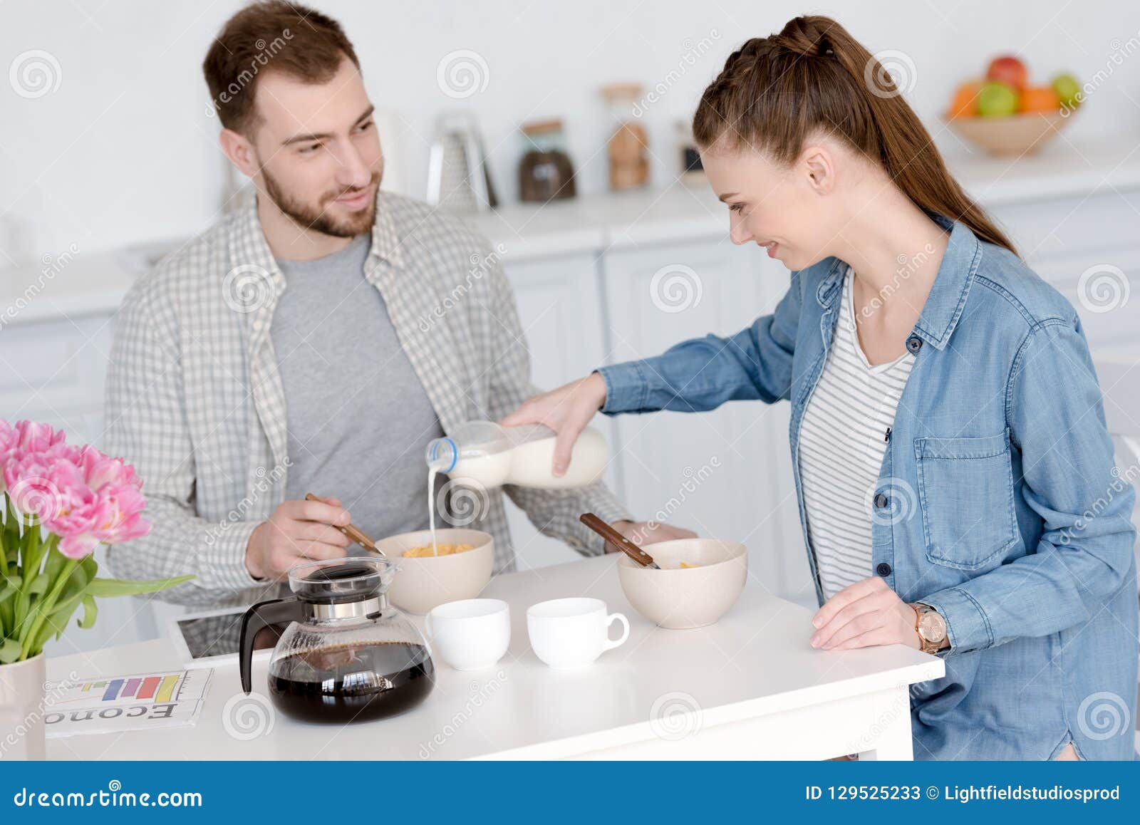 Young Couple Having Breakfast with Corn Flakes Stock Image Image of