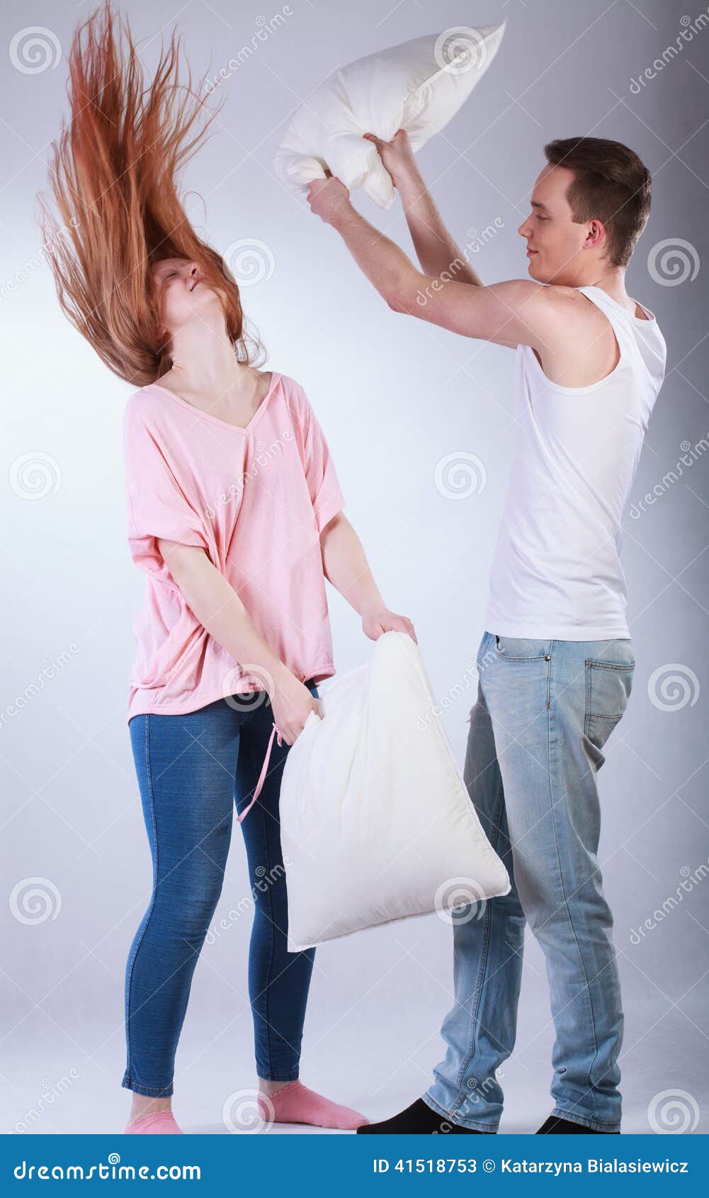 Young Couple Having Pillow Fight Stock Image Image of brother