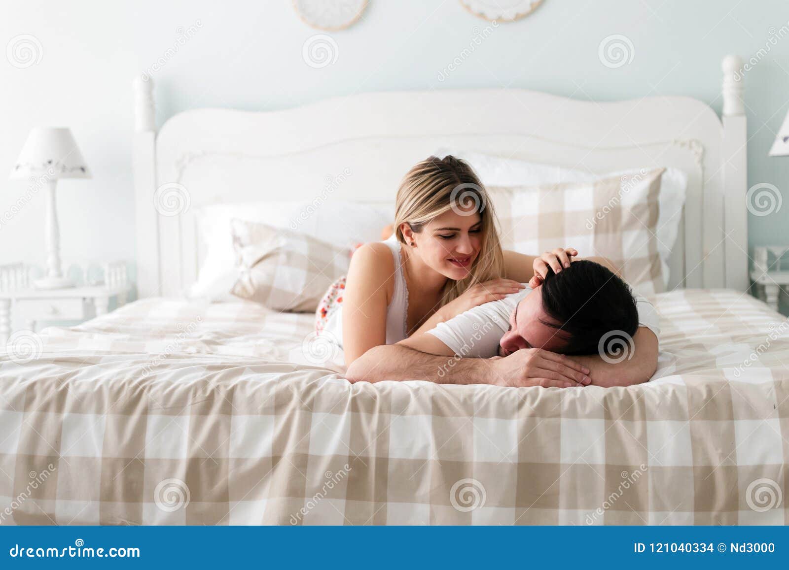 Young Couple Having Romantic Time In Bedroom Stock Photo Image Of