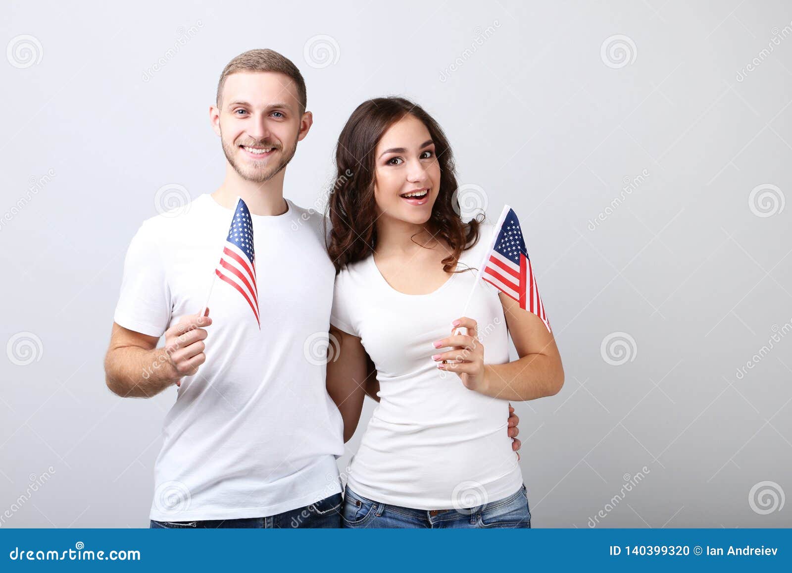 Young Couple Holding an American Flags Stock Photo Image of