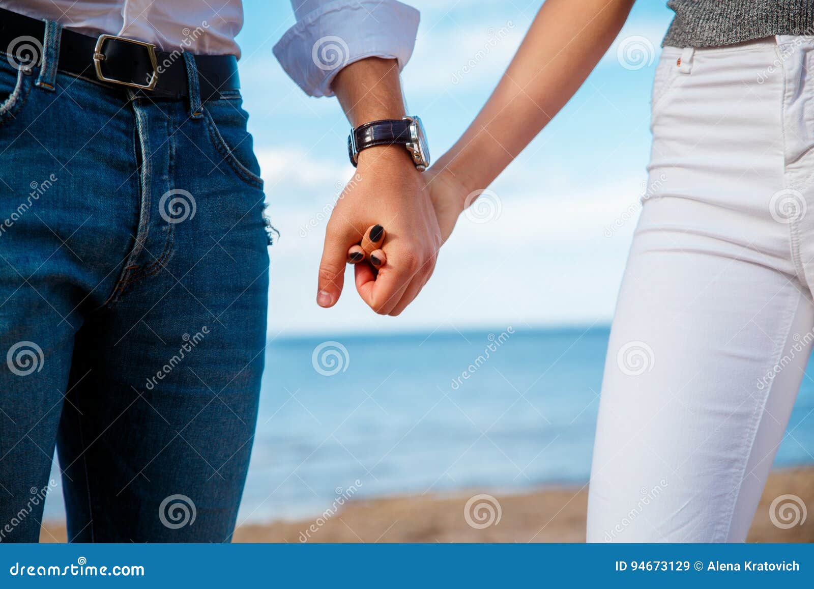 Young Couple Holding Hands At The Beach Stock Image Imag