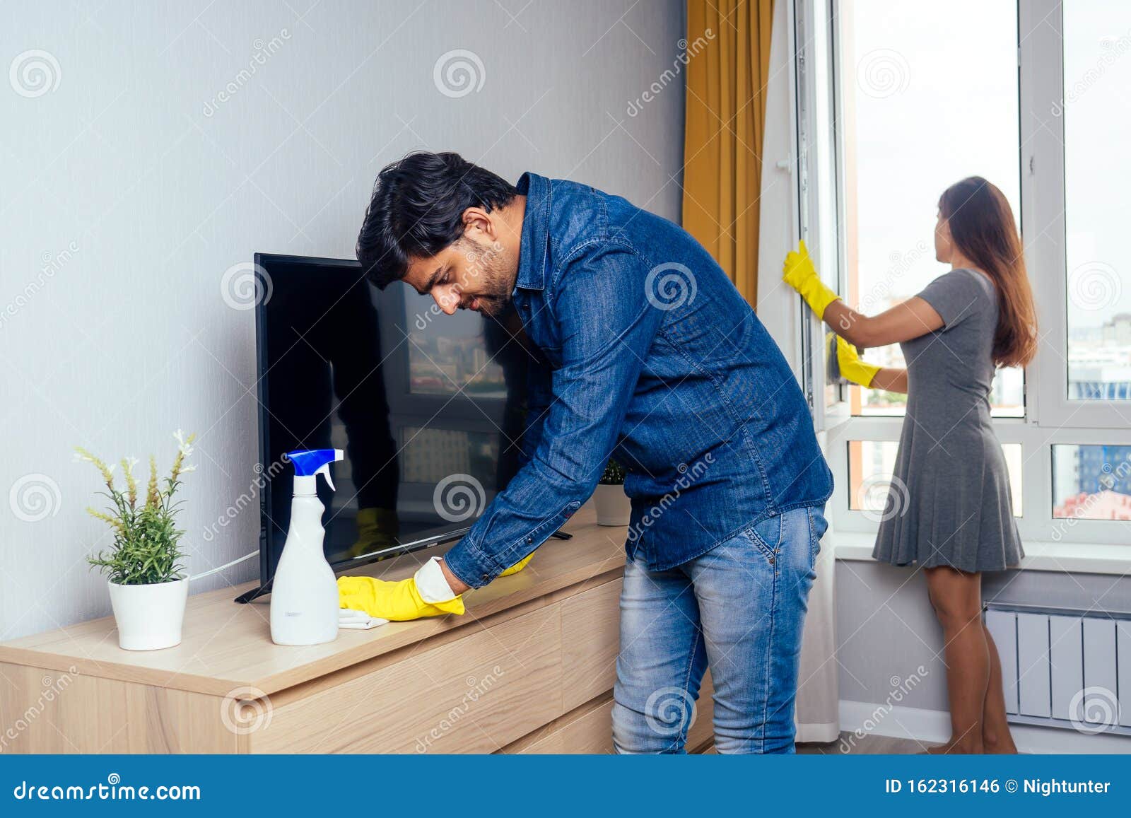 Young Couple Indian Moving in New Home, Cleaning and Unpacking Big Window  with Stylish Yellow Curtain Background Stock Photo - Image of female,  housekeeping: 162316146