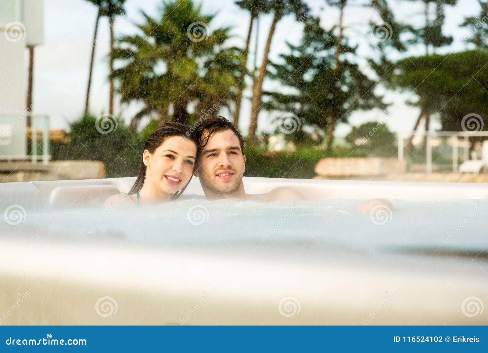 Young couple in a jacuzzi stock photo. Image of honeymoon 116524102