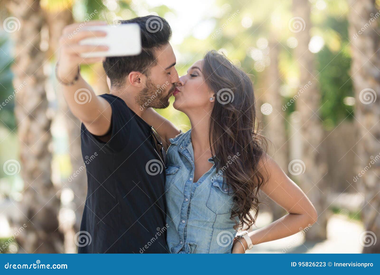 Young Couple Kissing Each Other Posing To Selfie Stock Image Image Of Love Adult 95826223 