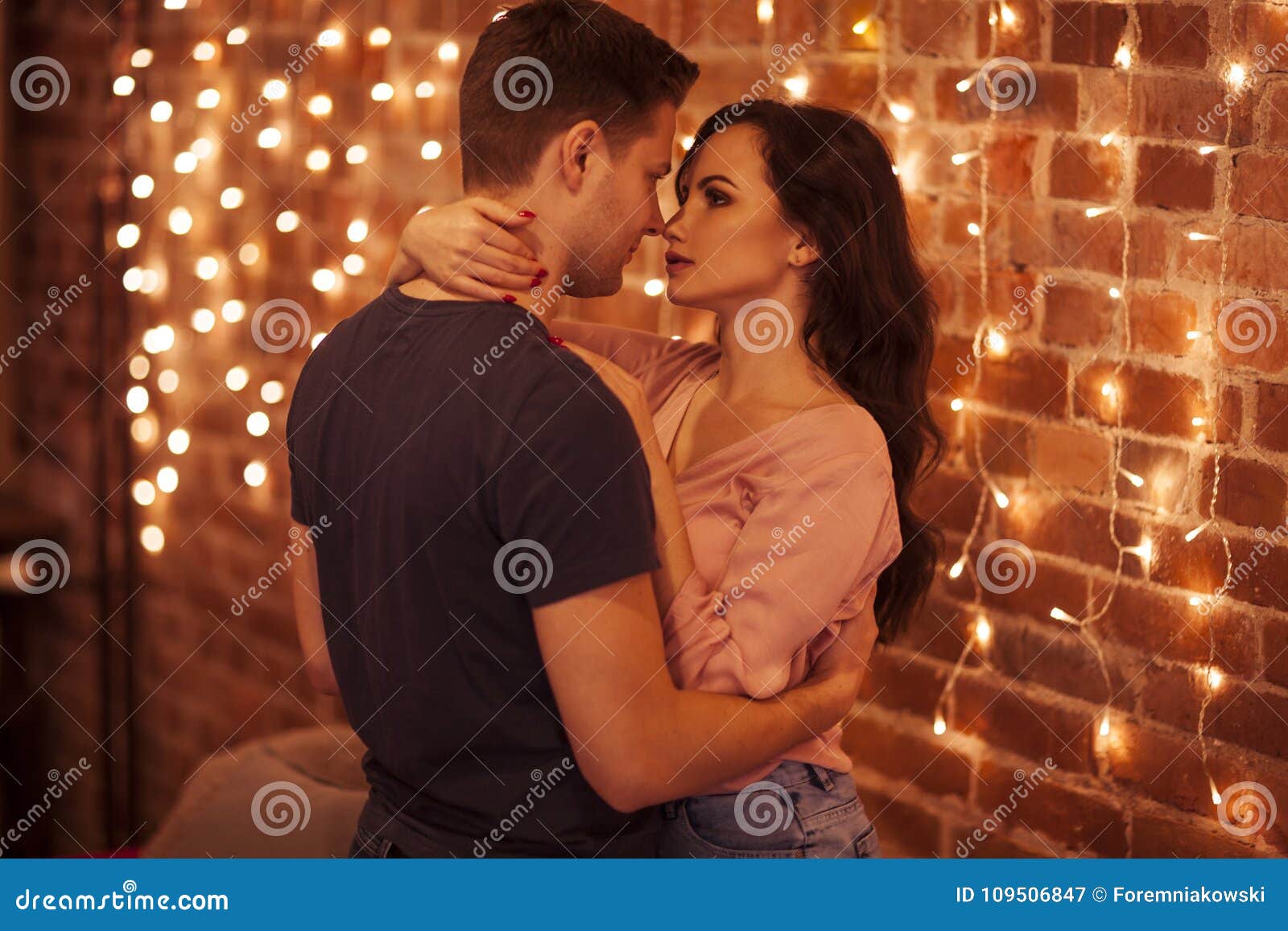 Young Couple Kissing and Hugging in the Bedroom. Such a Romantic ...