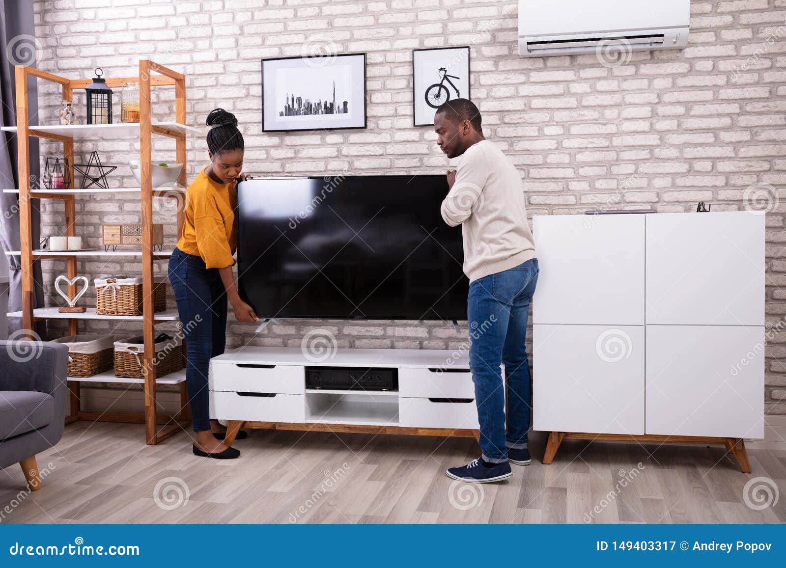 Young Couple Lifting Television Stock Image Image of furniture