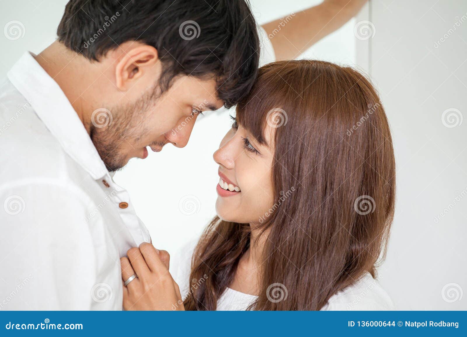 Young Couple in Love Looking To Each Other