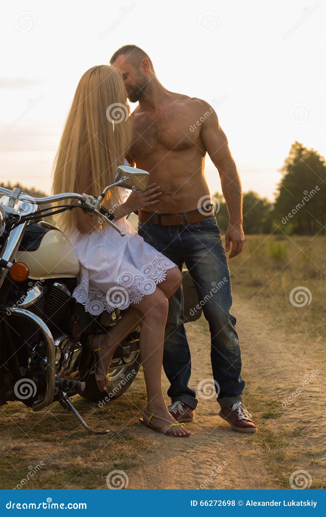 A Young Couple In Love On A Motorcycle In The Field Stock Photo Image Of Motorbike Drive A Young Couple In Love On A Motorcycle In The Field Stock Photo Image Of Motorbike Drive
