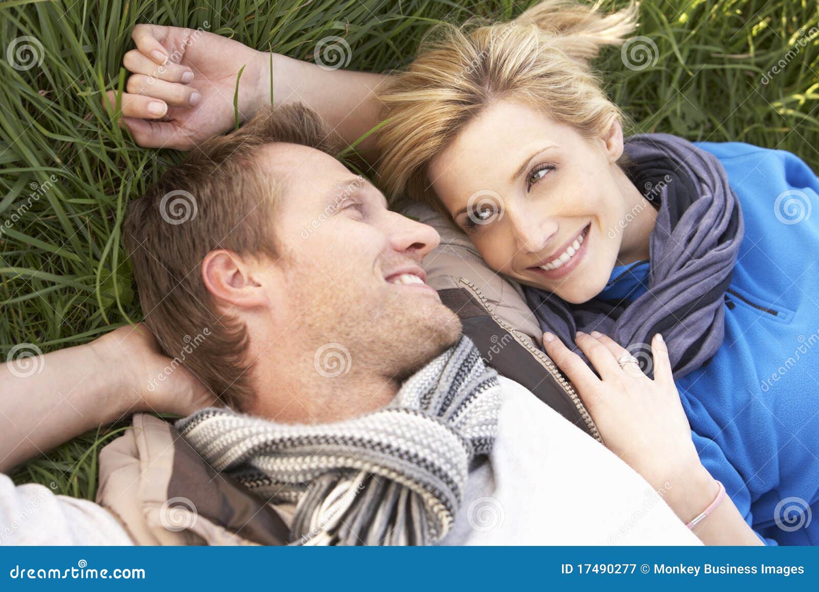And Lying Together In Grass Lying Together On Grass Stock Image Image