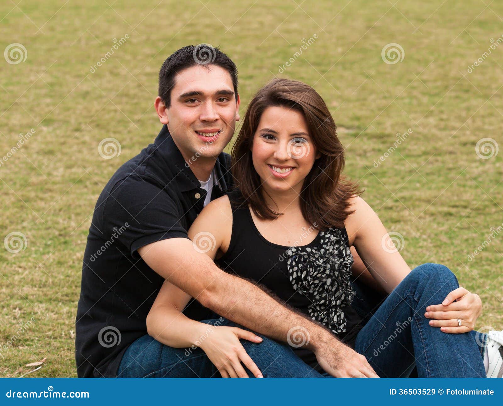 Loving couple sitting on car on road near forest - a Royalty Free Stock  Photo from Photocase