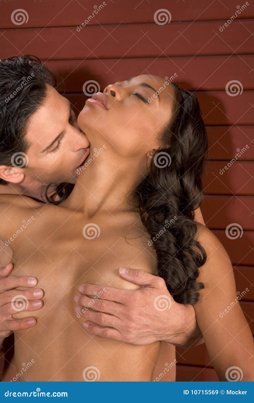 Man and woman kissing naked