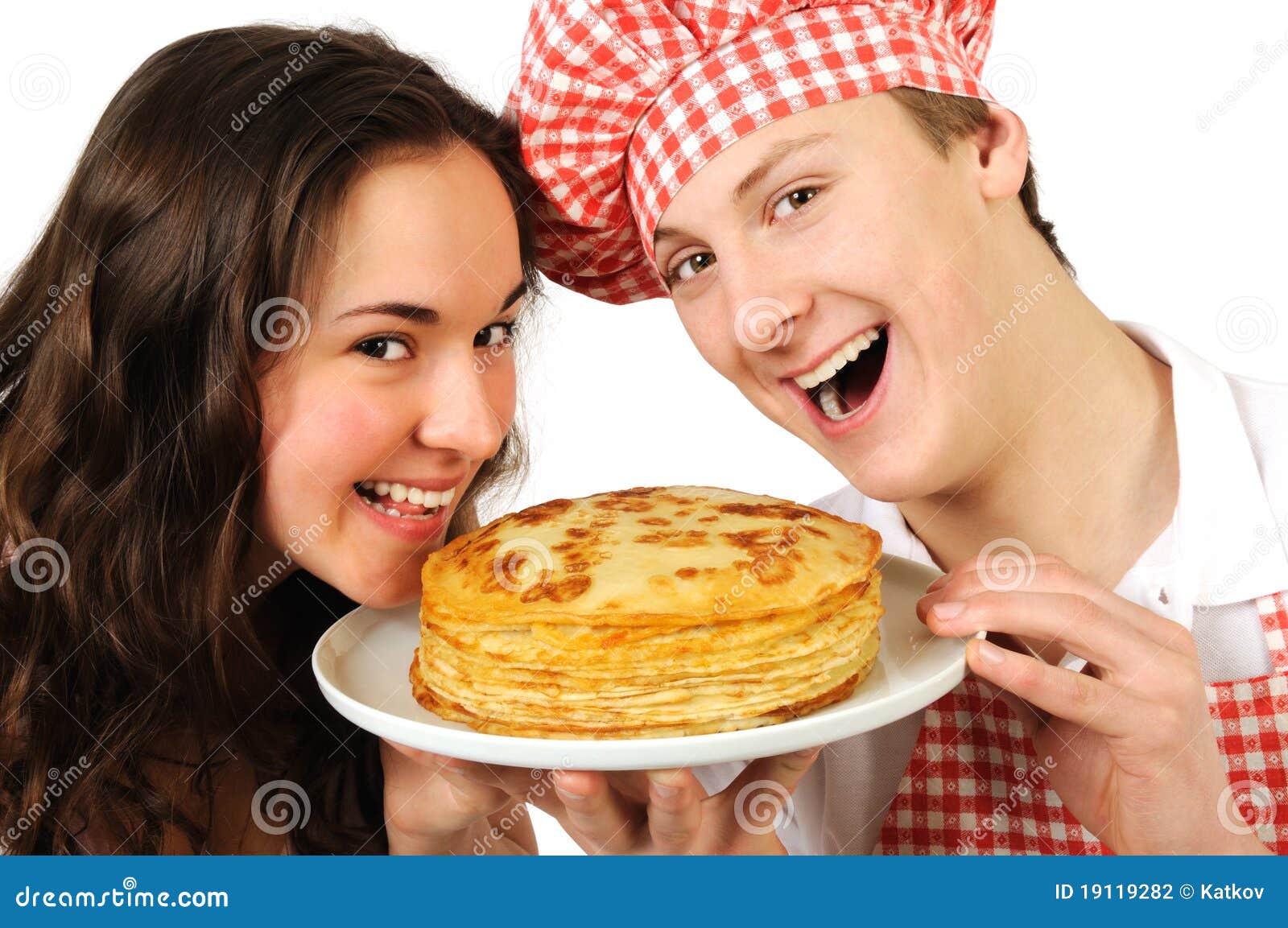 Young couple with pancakes stock photo. Image of chief 19119282