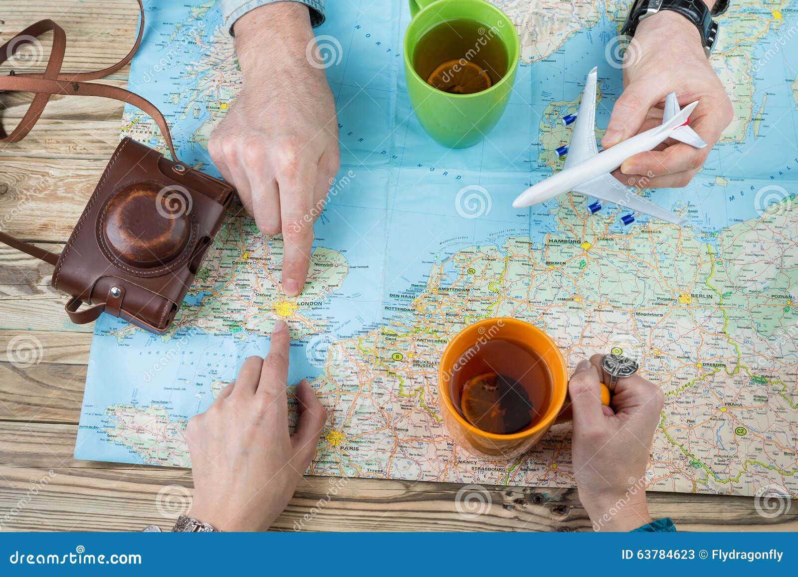 Young Couple Planning A Family Trip To London. Stock Photo ...