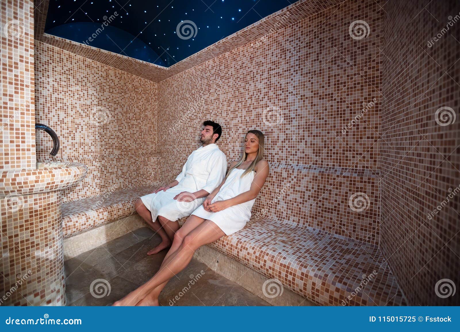 Young Couple Relaxing Inside Spa Sauna Turkish Bath - Two Lovers Enjoying Vacation in Luxury Resort Hotel Stock Image image