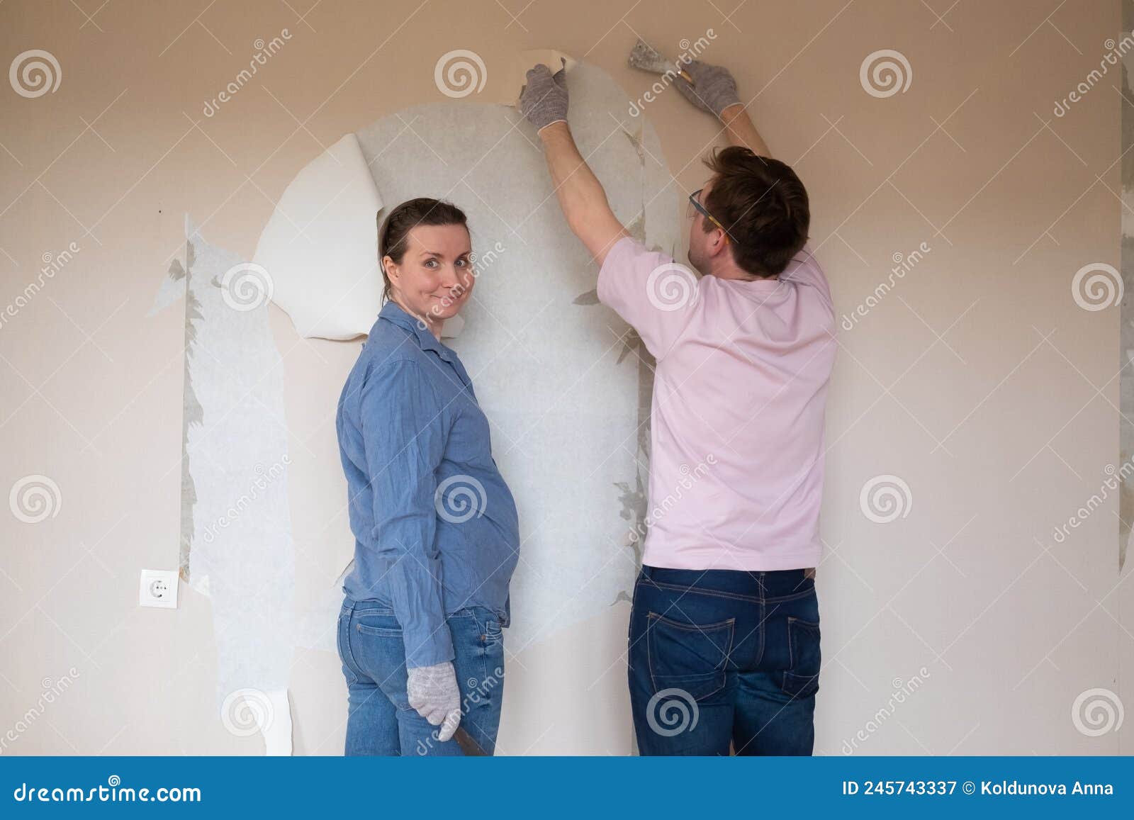 Renovation Of Room Preparation Of Walls Cleaning Wall From Wet Old  Wallpaper With Metal Spatula Stock Photo Picture And Royalty Free Image  Image 64521477