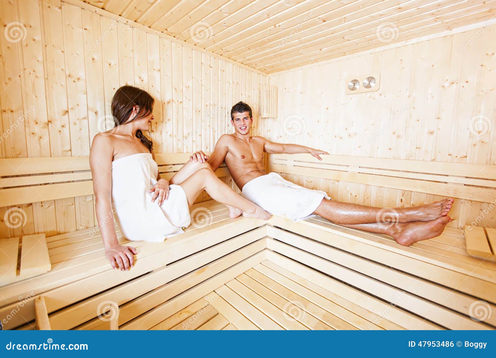 Young couple in the sauna stock photo. Image of group 47953486