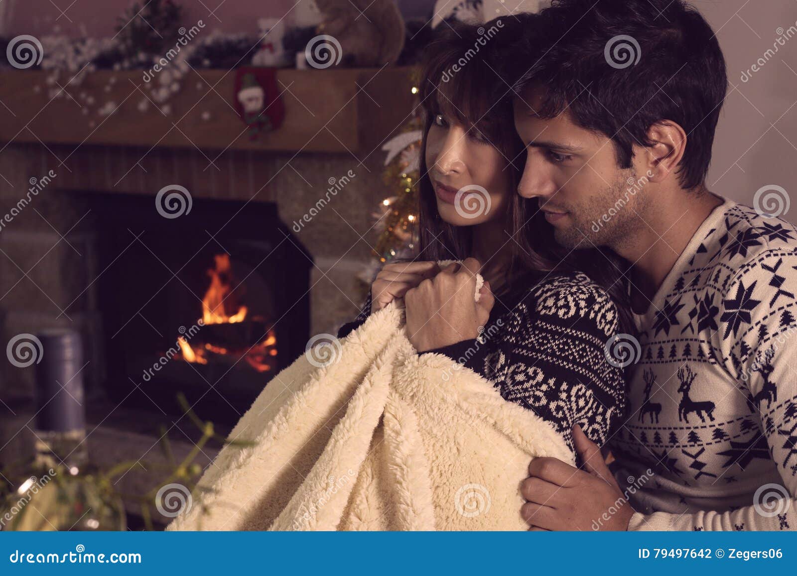 Young Couple Sitting Under a Warm Blanket Stock Photo Image of coil