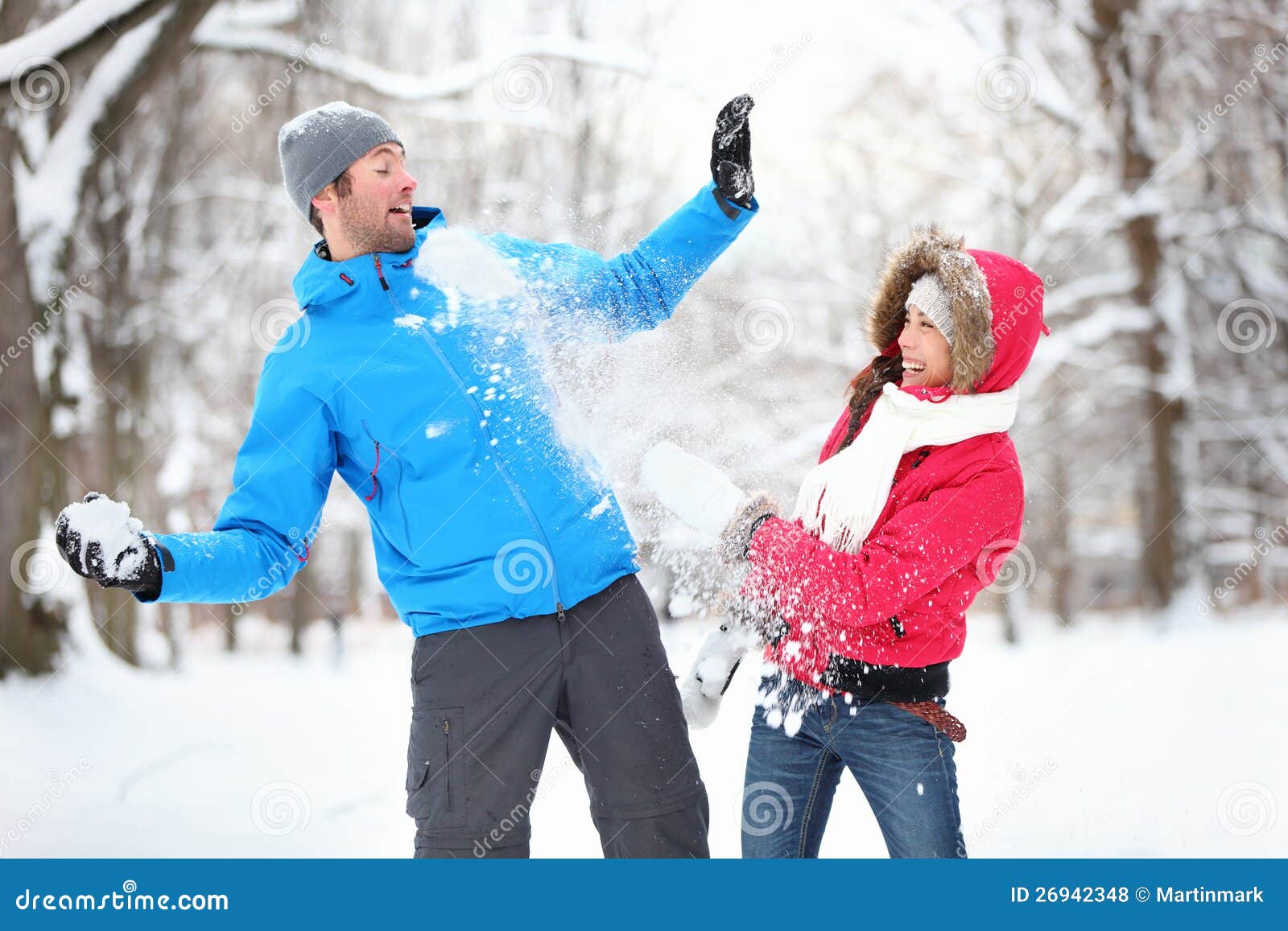 Young Couple in Snowball Fight Stock Photo Image of friendship, mock 26942348