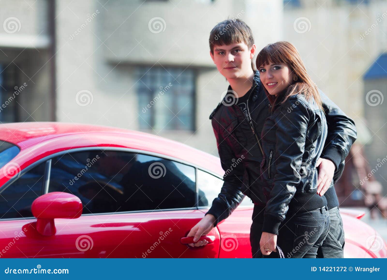 Young Fashion Couple In Love At The Sport Car Stock Photography Image