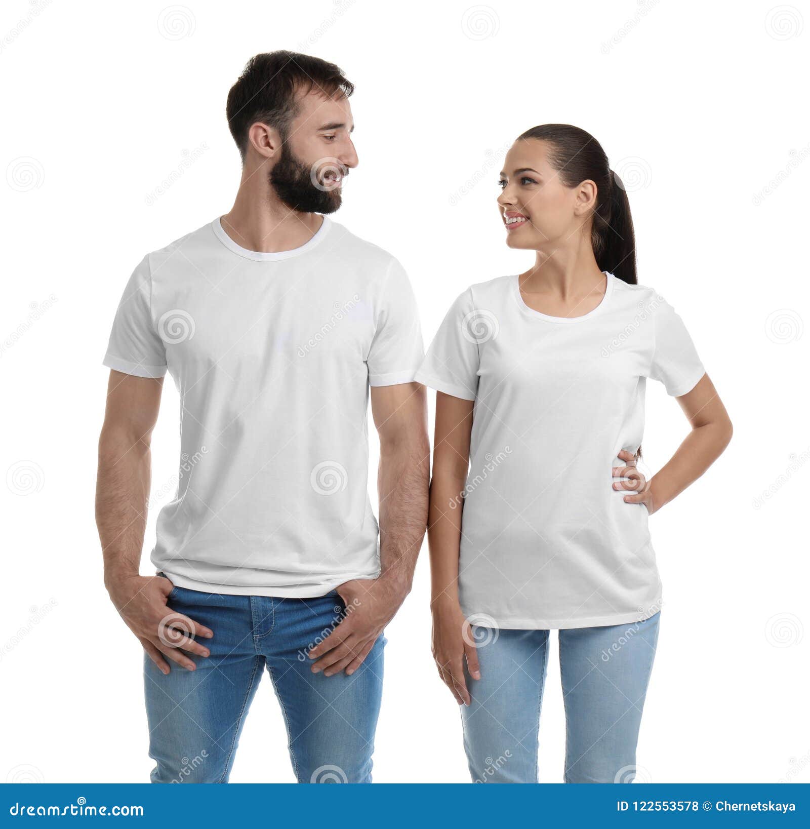 Download Young Couple In T-shirts On White Background. Stock Photo ...