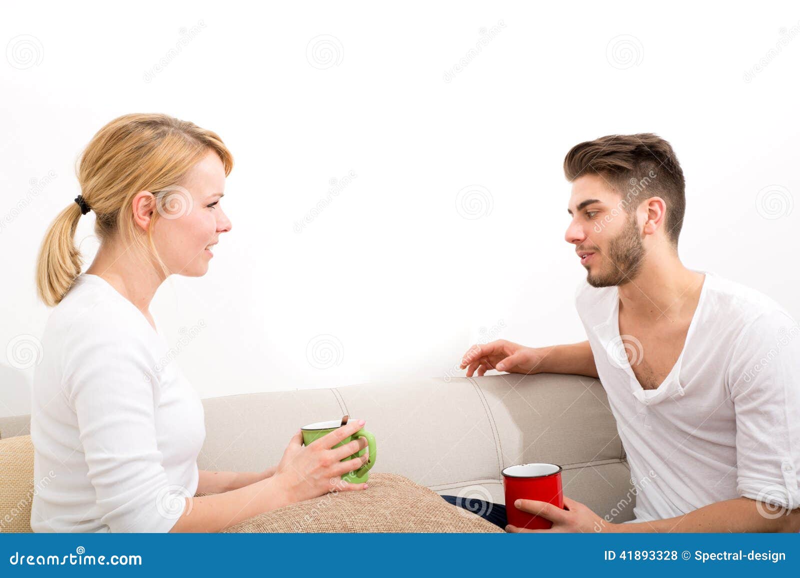 Young Couple Talking on the Sofa Stock Photo Image of adult