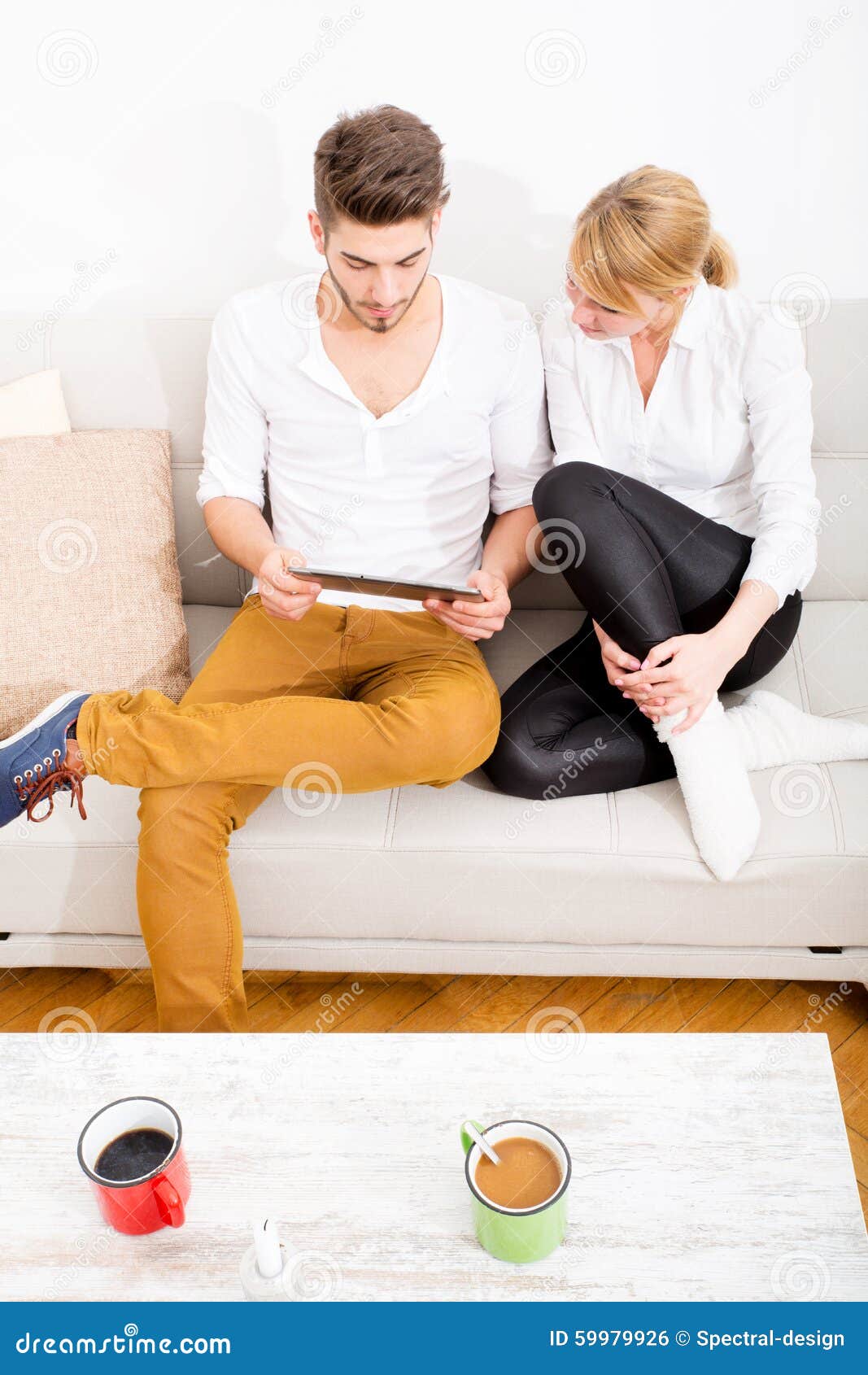 Young Couple Talking on the Sofa Stock Photo Image of discussion