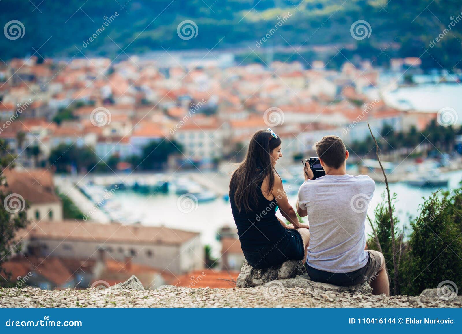 young couple travelling and visiting europe.summer touring europe and mediterranean culture.colourful streets,cityscape