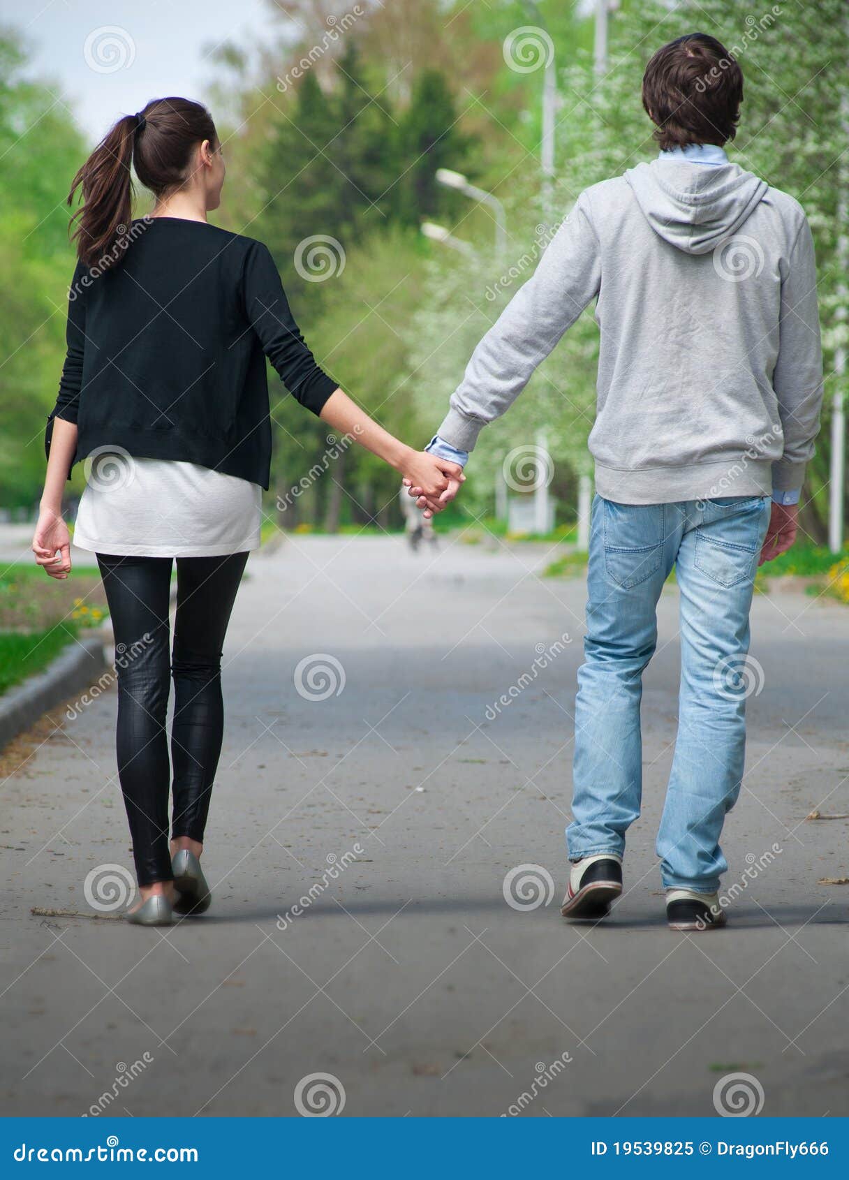 Young Couple Walking Together in Park Stock Image Image of boyfriend